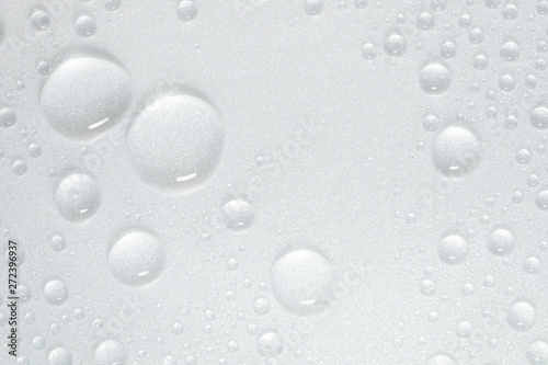 Drops of water on white surface