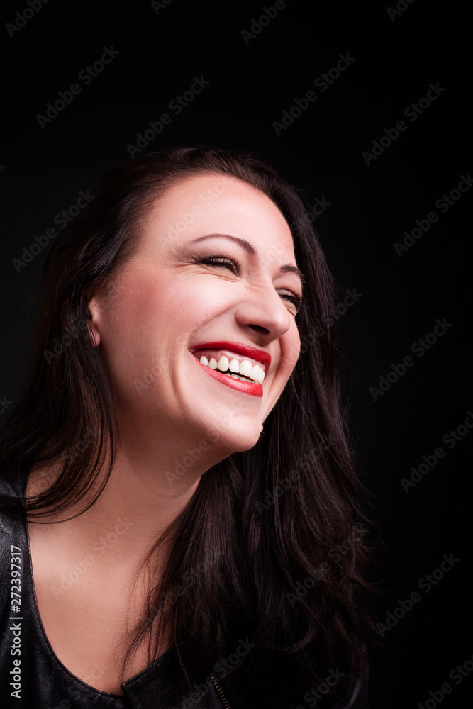 A portrait of beautiful face with beautiful eyes - isolated on black background. A portrait of beautiful face with beautiful eyes - isolated on black background.