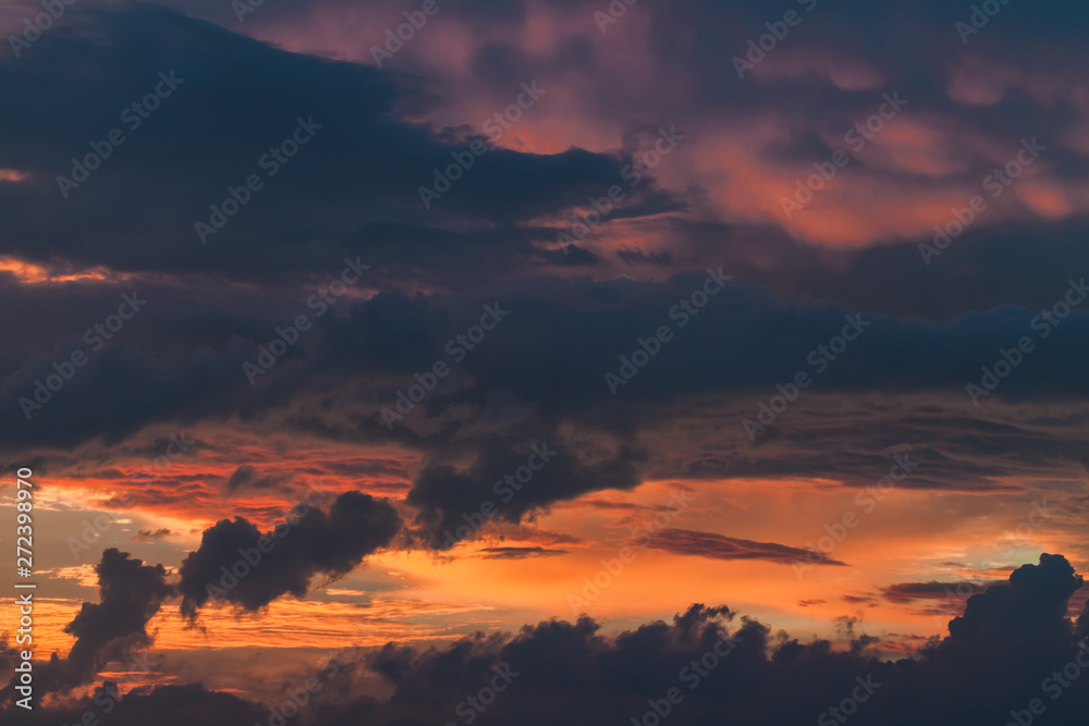 Cloudy tropical sky at sunset