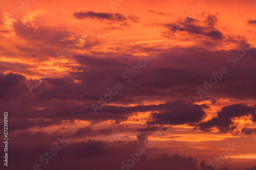 Red cloudy tropical sky at sunset