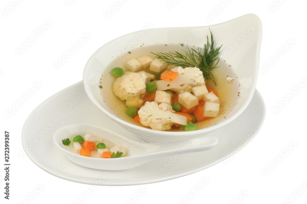 Vegetable soup with cauliflower, potatoes, peas, carrots and dill on a white isolated background Vegetable soup with cauliflower, potatoes, peas, carrots and dill on a white isolated background