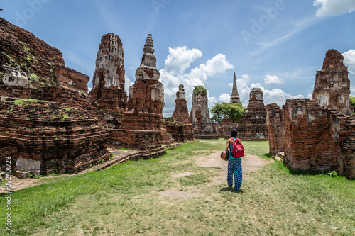 Girl exploring Ayutthaya Historical Park in Thailand