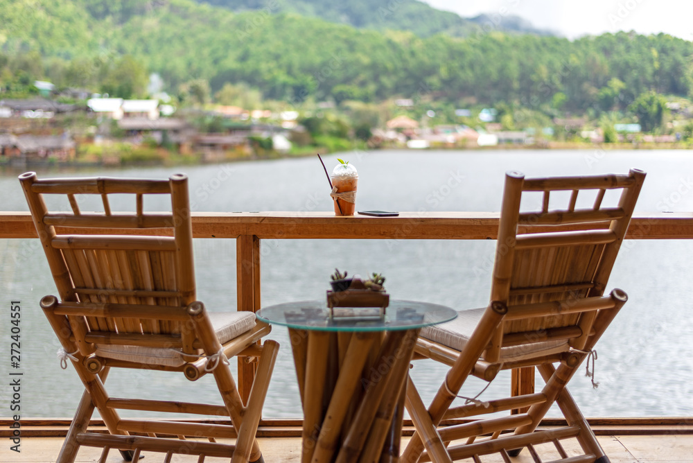 The chair in wood terrace against beautiful view relax and happy day, outdoor resort.. Lifestyle Concept
