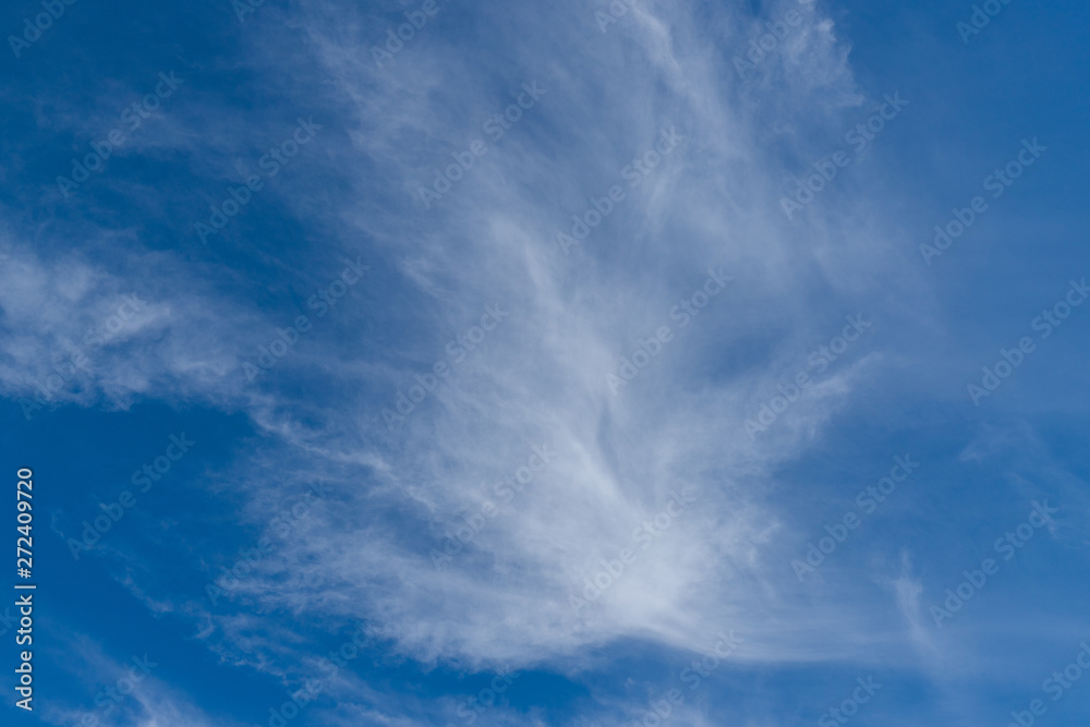 Thin white clouds on blue sky. Thin white clouds on blue sky.