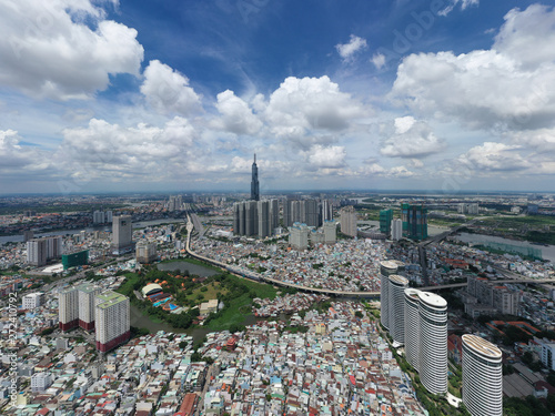 Photography Top View of Building in a City - Aerial view Skyscrapers flying by drone of Ho Chi Mi City with development buildings, transportation, energy power infrastructure