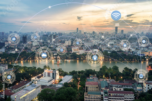 Smart city and wireless communication network concept. Digital network connection lines of Hanoi city at Hoan Kiem lake or Ho Guom