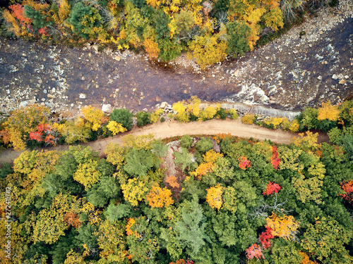 Obraz na płótnie Swift river landscape at autumn in New Hampshire, USA. Fall in New England. Aerial drone shot. w salonie