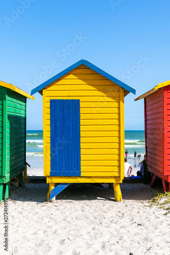 Muizenberg beach with colorful wooden cabins in Cape Town, South Africa © Dmitrii