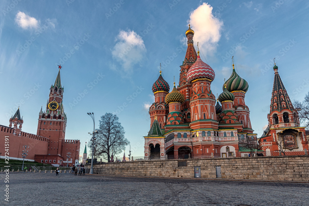 Tourists walking near Kremlin and St Basil's Cathedral in Moscow