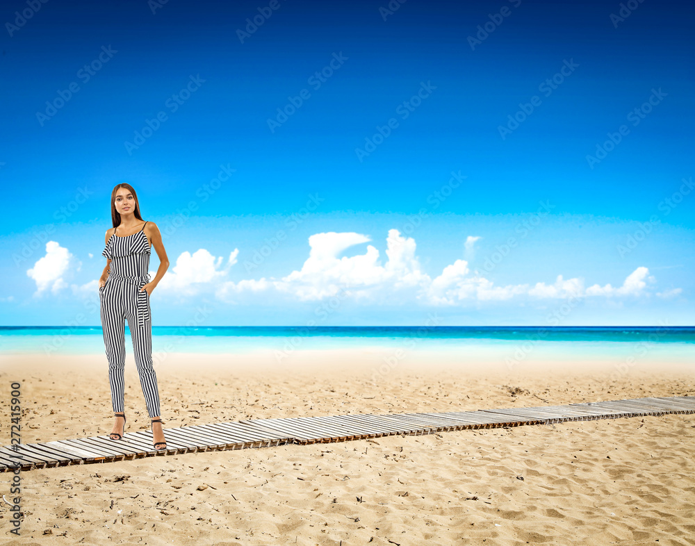 Slim young woman on beach and summer time 