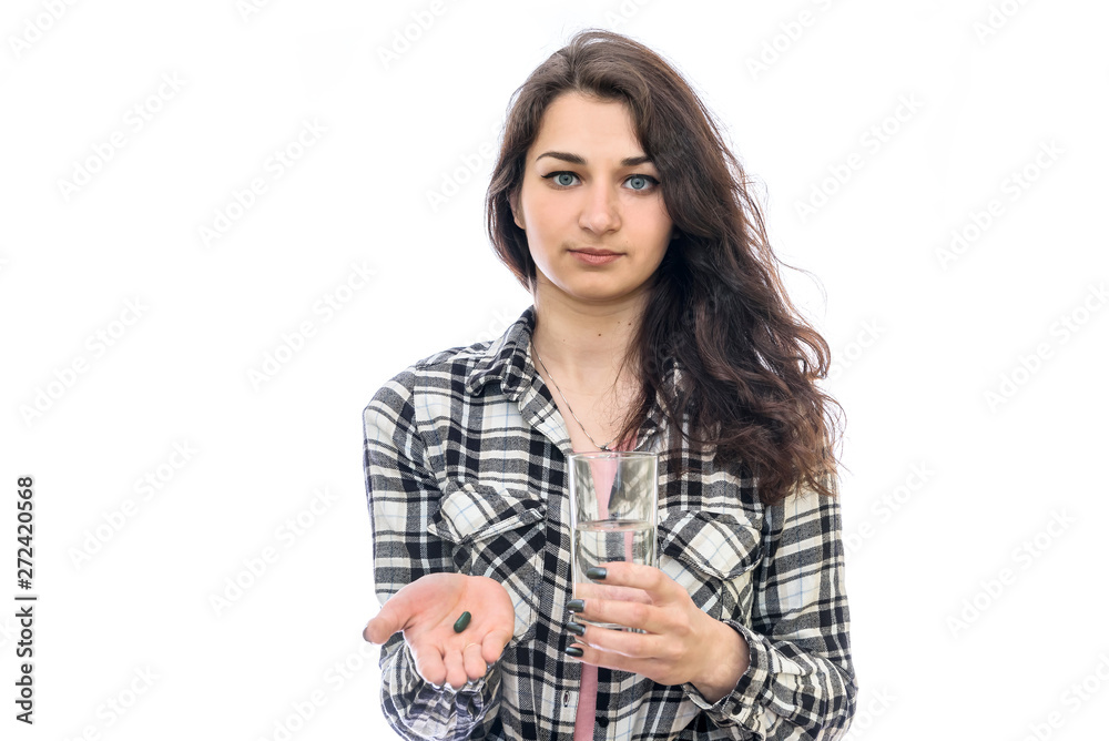 Woman with pills and glass of water isolated on white Woman with pills and glass of water isolated on white