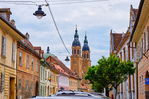Towers of Holy Trinity Cathedral (Catedrala Sfanta Treime din Sibiu) as seen from the city streets. This Byzantine style basilica is the seat of the Romanian Orthodox Archbishop of Sibiu.