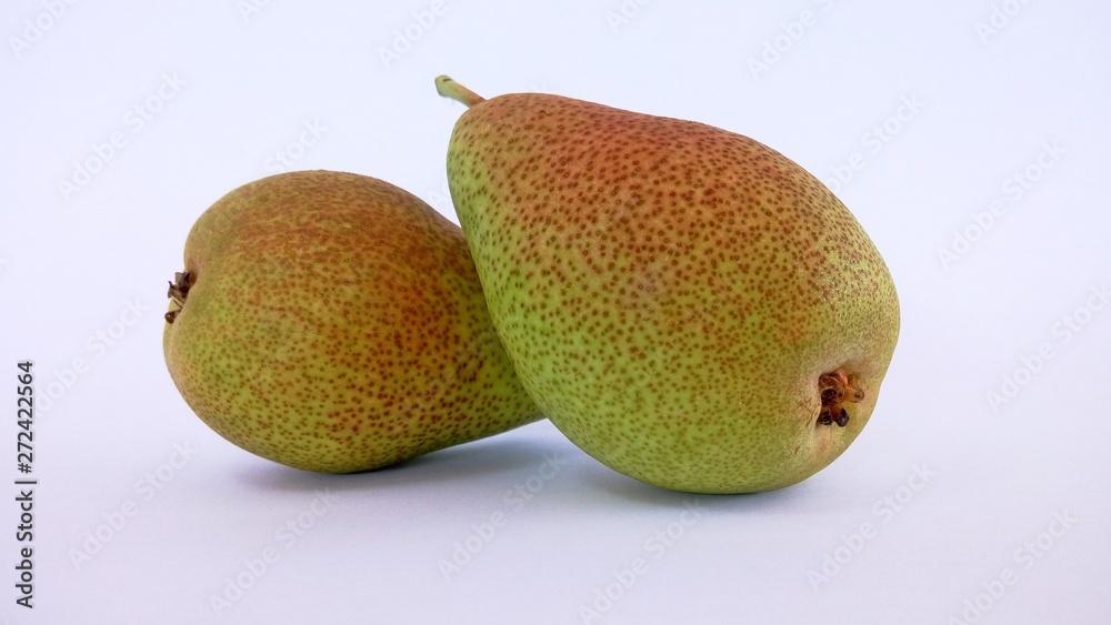 two blushed pears isolated on white background