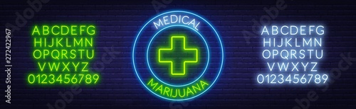 Medical marijuana neon sign. Neon alphabet on brick wall background. Template for design.