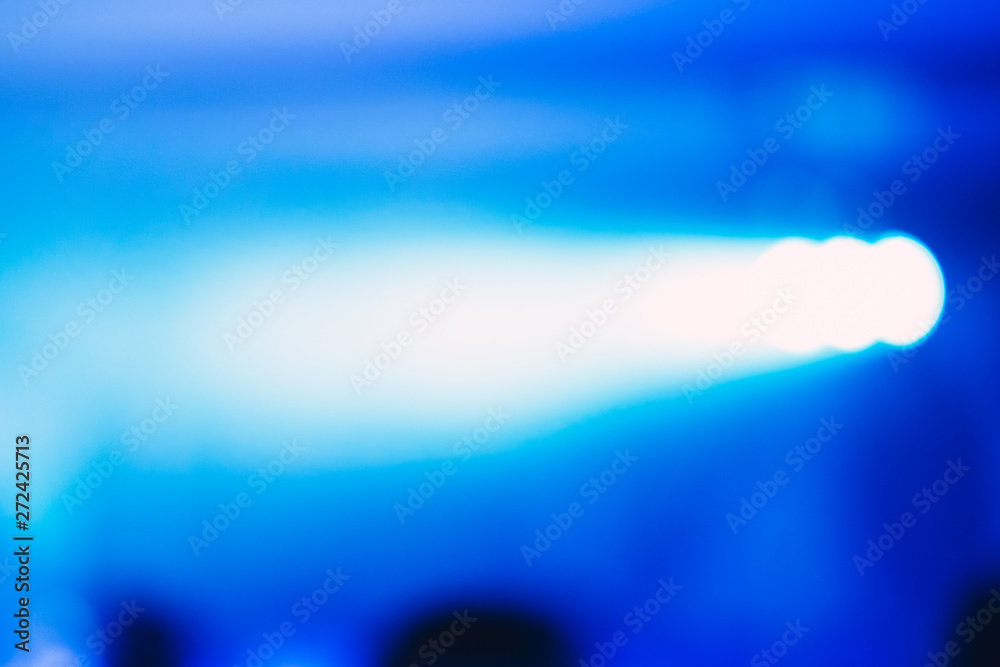 Blue spotlight glow sparkle rays lights for background/texture. Blue spotlight glow sparkle rays lights for background/texture.