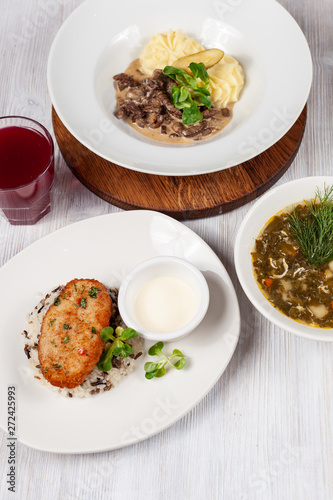 Crunchy chicken cutlet with steamed rice as a part of healthy lunch