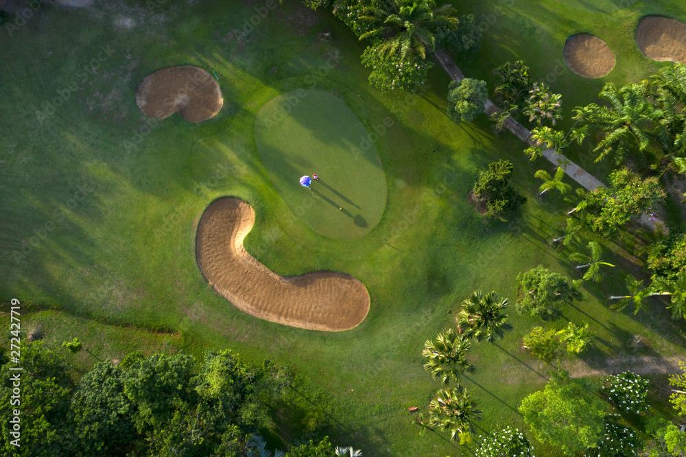 Aerial view of the green golf course in Thailand.