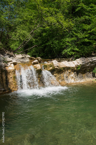 Fototapeta Naklejka Na Ścianę i Meble -  Caucasian mountains. Waterfall on the mountain river Zhane.