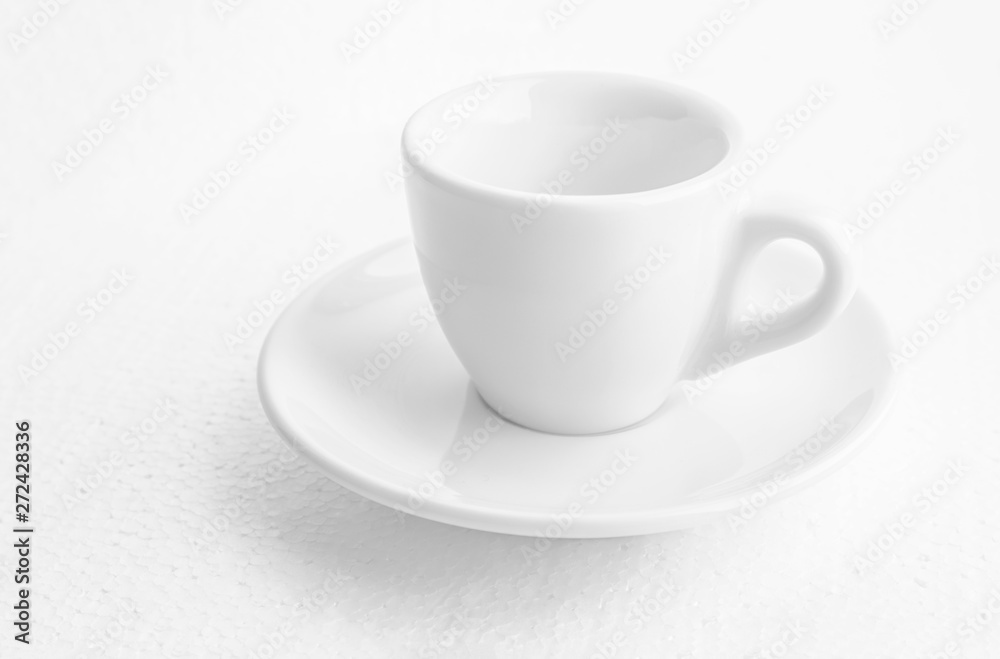 white coffee cup and saucer, empty coffee-free coffee cup, front view from above, or black coffee, on a white background,copy space white coffee cup and saucer, empty coffee-free coffee cup, front view from above, or black coffee, on a white background,copy space