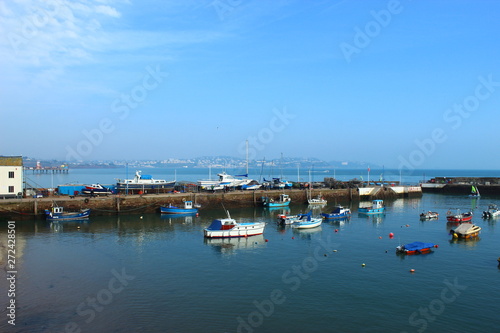 Boats moored in a harbour