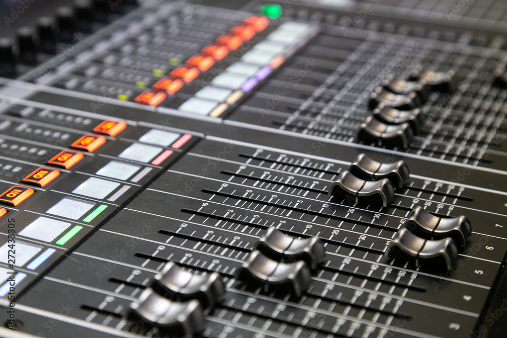 Professional audio mixer. Close up. Selective focus.