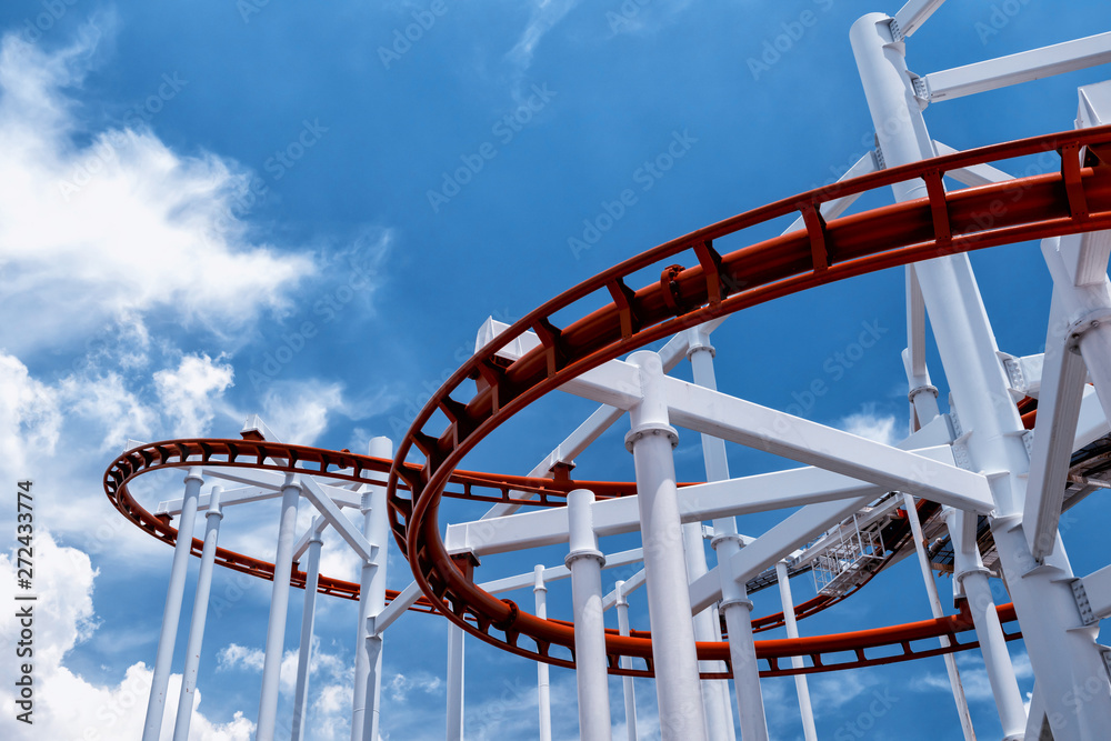 roller coaster against clear blue sky