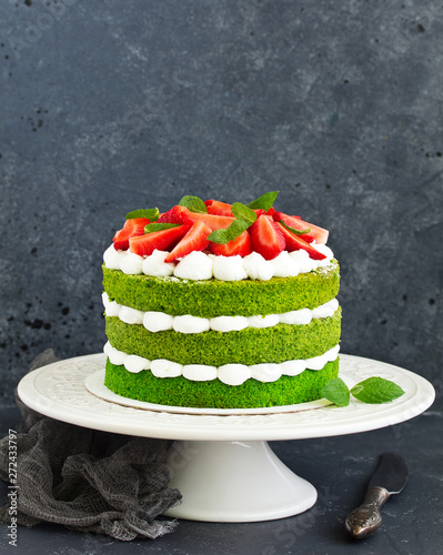 Cake with spinach, cream and strawberries. Valentine's Day.