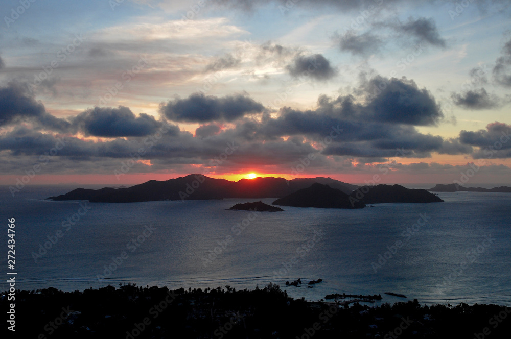 Sunset of the Island of Praslin from La Digue Island, Seychelles