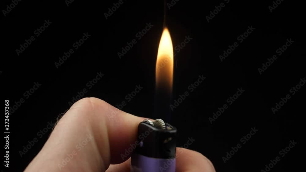 Slow Motion Video of Using a Lighter at Night with Sparkles and Fire Slow Motion Video of Using a Lighter at Night with Sparkles and Fire