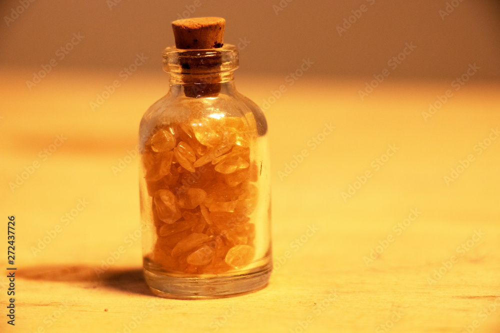 Corked bottle of citrine crystals Corked bottle of citrine crystals