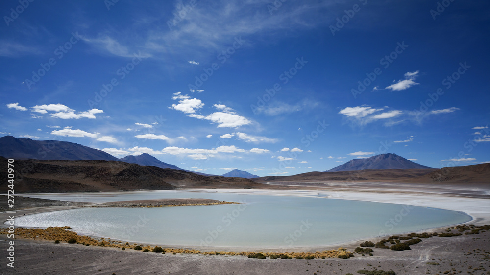 Beautiful lagoon in a Bolivian desert during Salar de Uyuni tour. Beautiful lagoon in a Bolivian desert during Salar de Uyuni tour.