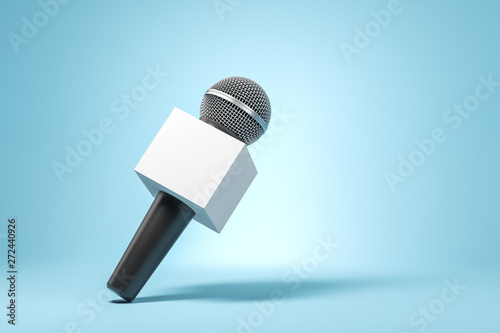 Black microphone with blank box on the blue background. News concept. 3 photo