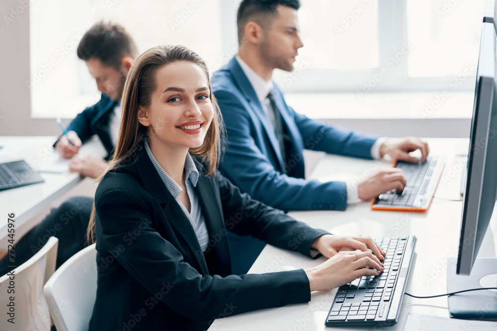 Business people working on computer in his workplace Business people working on computer in his workplace