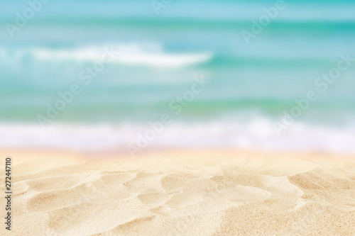 Empty sand beach in front of summer sea background with copy space © tomertu