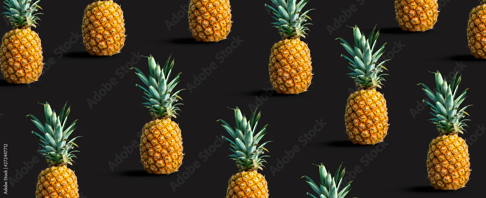 Many pineapples on a solid color background Many pineapples on a solid color background