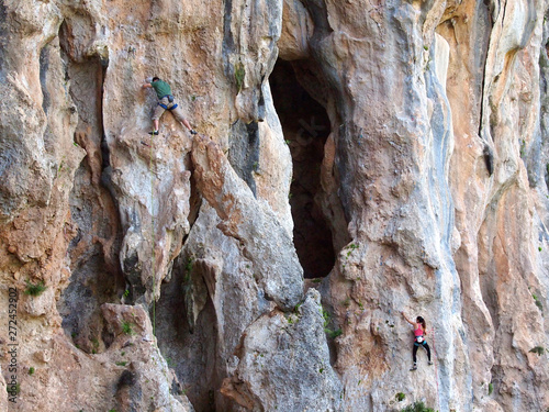 Rock climbing man and girl in Turkey, Geyikbayiri Route Trebenna,