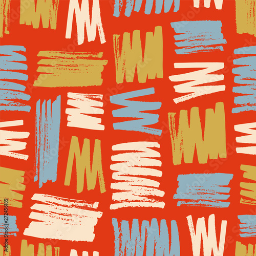 Vivid seamless pattern with colorful paint smears or marks on red background
