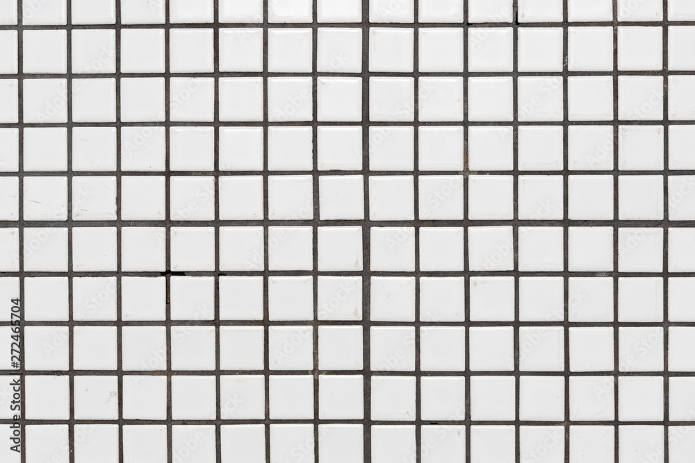 White dirty ceramic tiles wall or floor for background texture. White dirty ceramic tiles wall or floor for background texture.