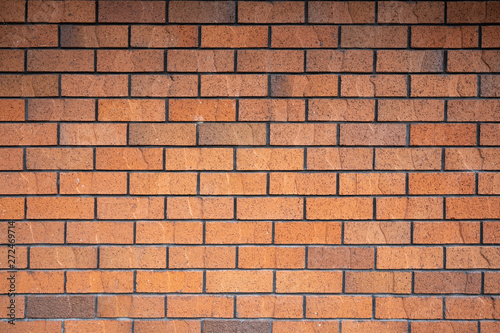 Horizontal brown brick wall.