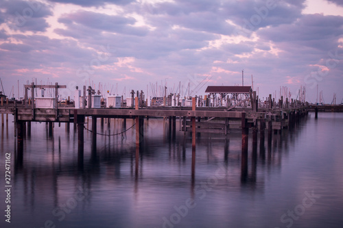 old wooden pier at sunrise © MARIO