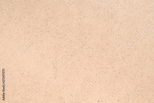 Beige plywood texture abstract art background. Solid color fiberboard surface. Empty space.
