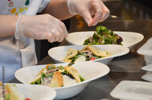Wallpaper Mural chef preparing salad of croutons and leaf lettuce Torontodigital.ca