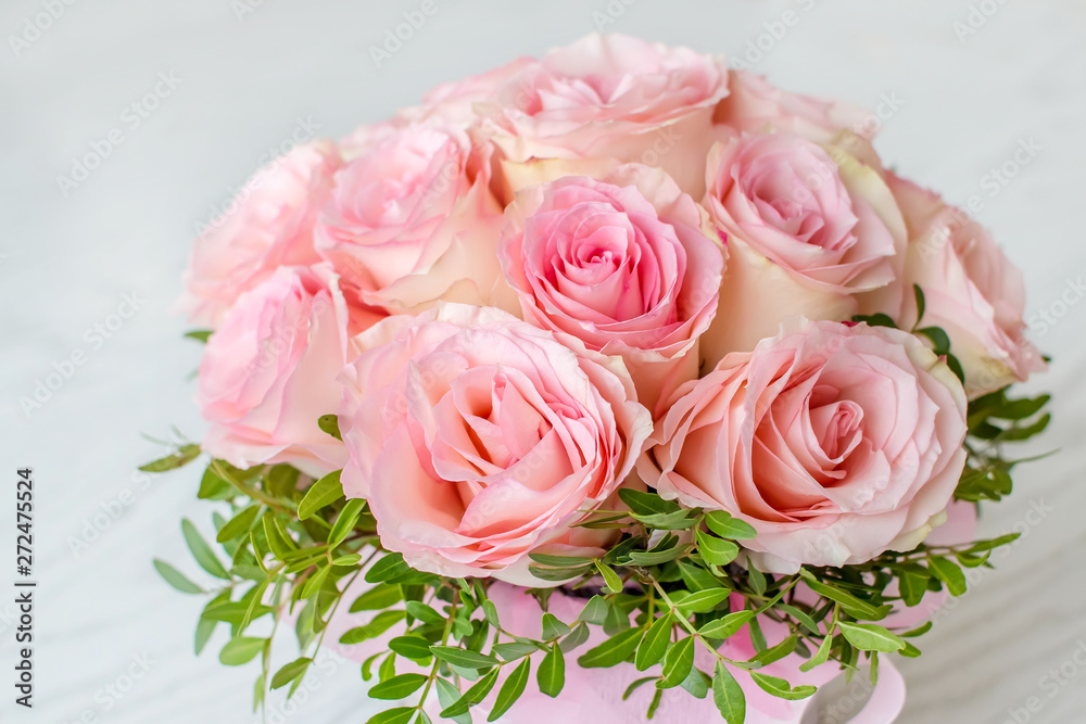 Beautiful Wedding bouquet of pink roses close up. The concept of marriage and love.