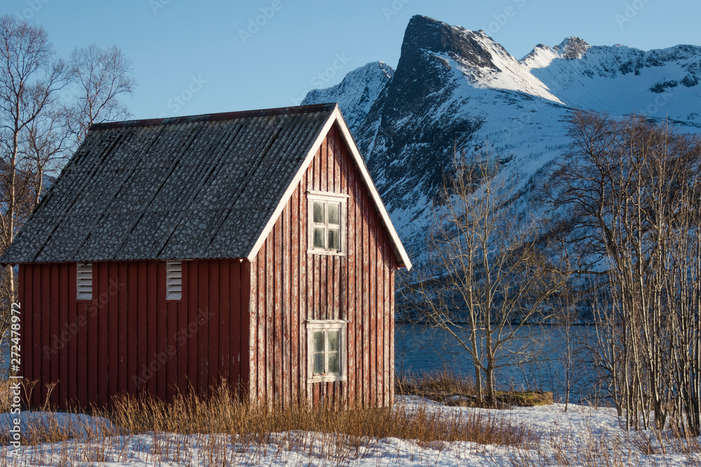 Old hut in a fjord Old hut in a fjord