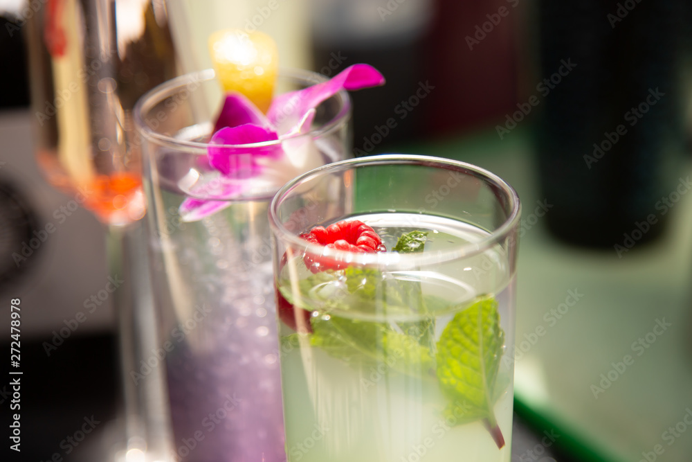Several attractive and garnished cocktails on the table Several attractive and garnished cocktails on the table