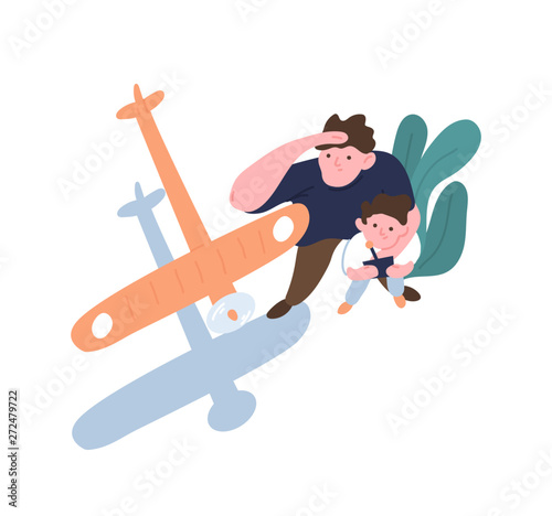 Father and son launch model aircraft