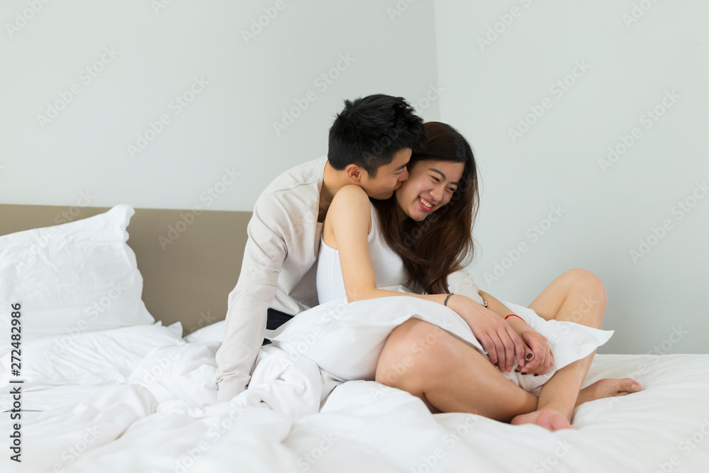 Young couple in bedroom