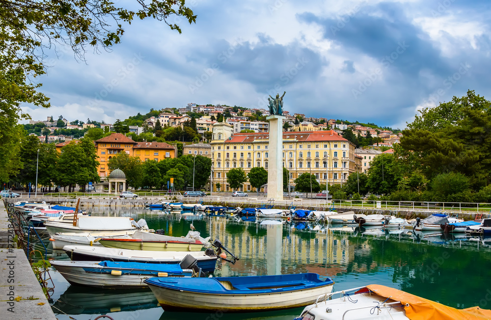 Rijeka, Croatia: Rjecina river with Liberation Monument, boats and view over the city and Trsat castle