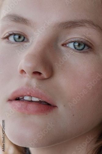Closeup beauty portrait of attractive young woman