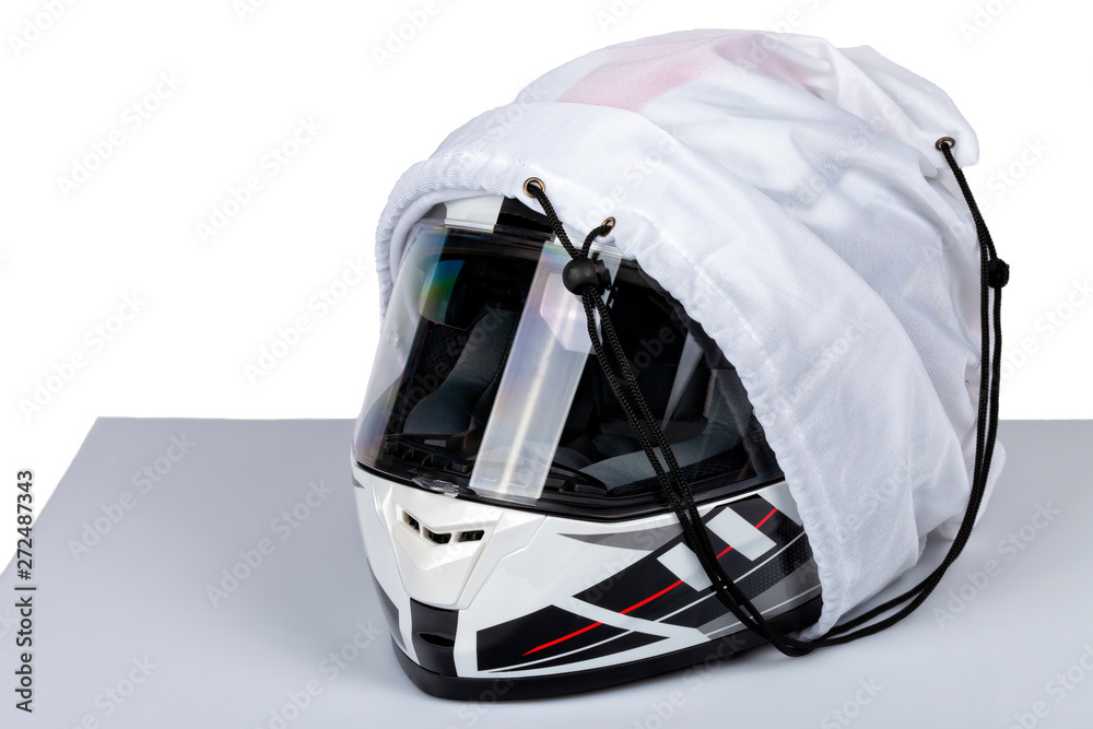 A white helmet full face of motorcycle inside its case isolated A white helmet full face of motorcycle inside its case isolated